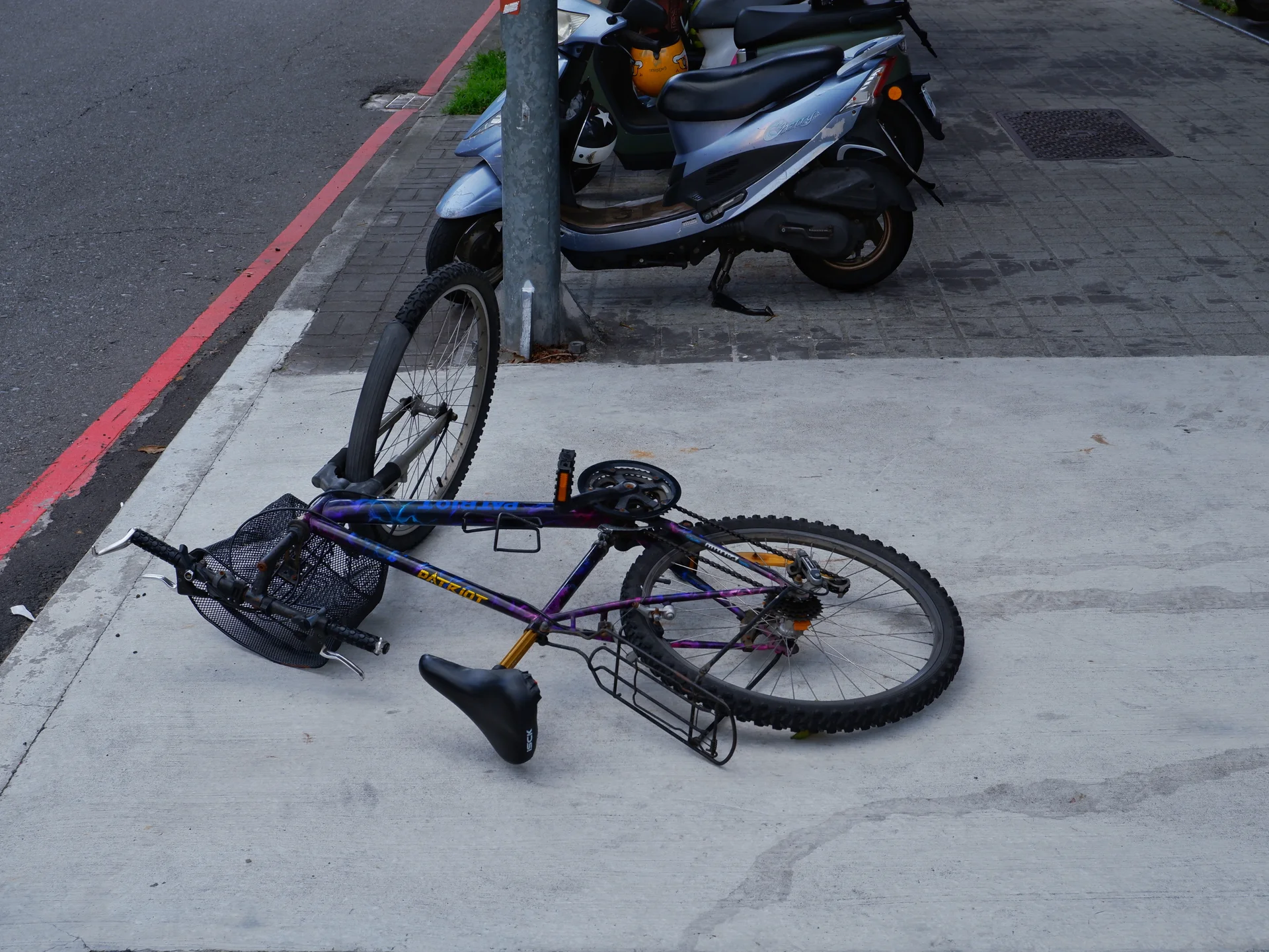 Another fallen bicycle