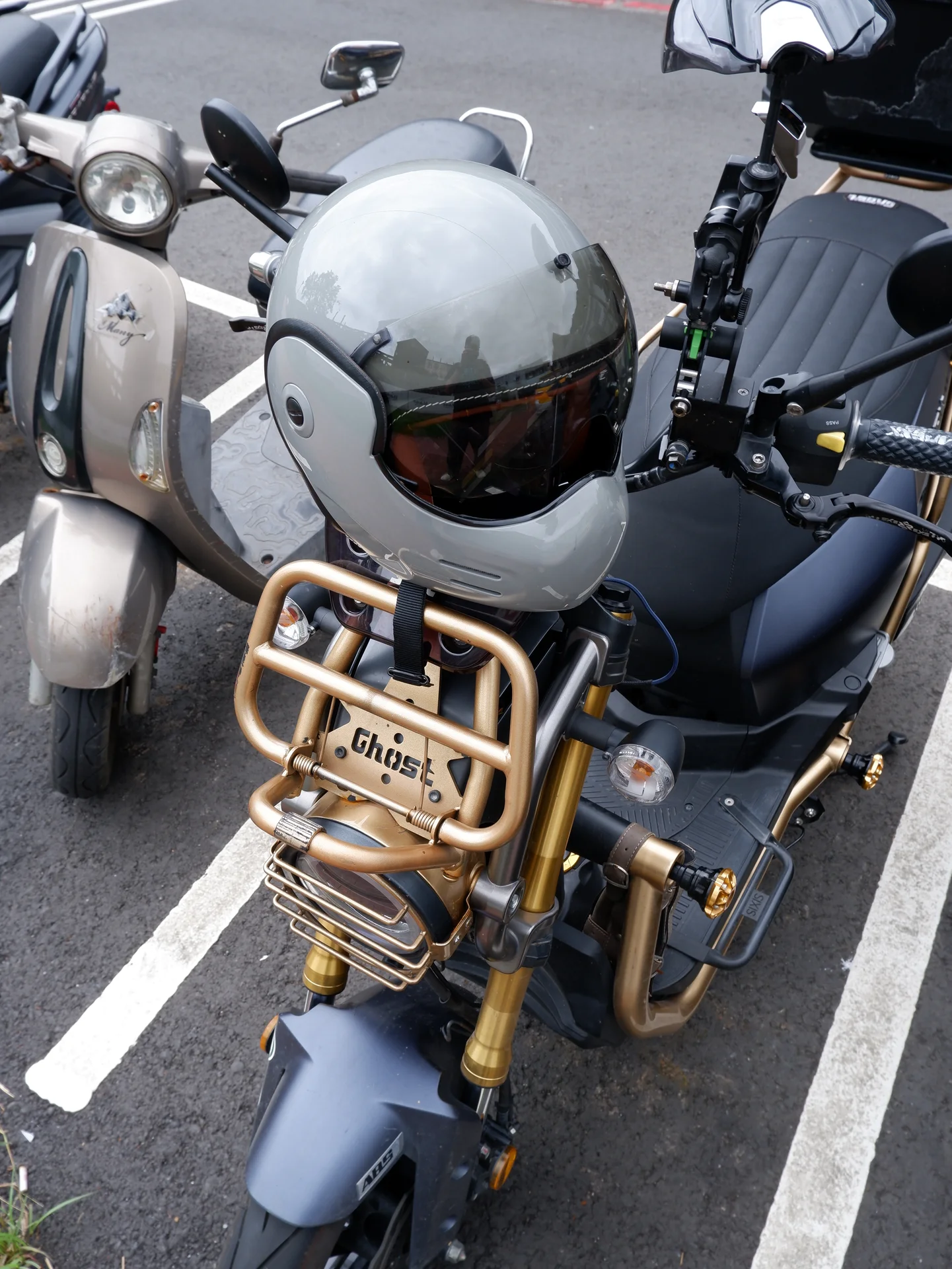 A helmet on a scooter